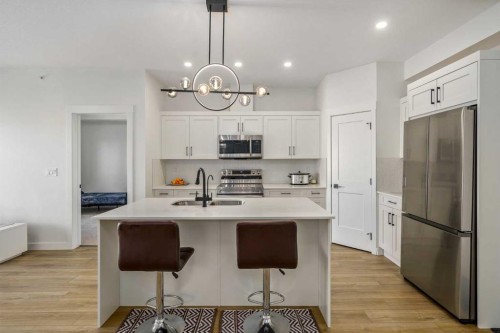 2406-200 Seton Circle Se, Calgary, AB - Indoor Photo Showing Kitchen With Upgraded Kitchen