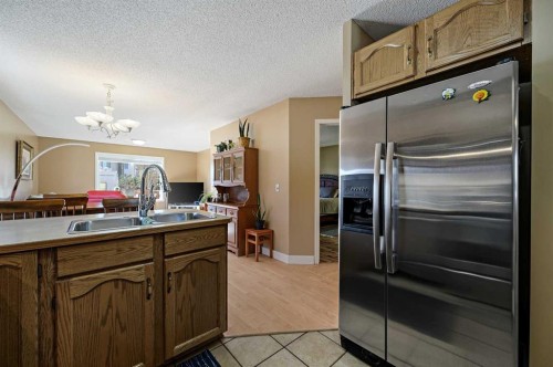 162 West Creek Bay, Chestermere, AB - Indoor Photo Showing Kitchen With Double Sink