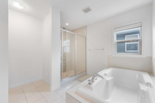 99 Evansglen Circle Nw, Calgary, AB - Indoor Photo Showing Laundry Room