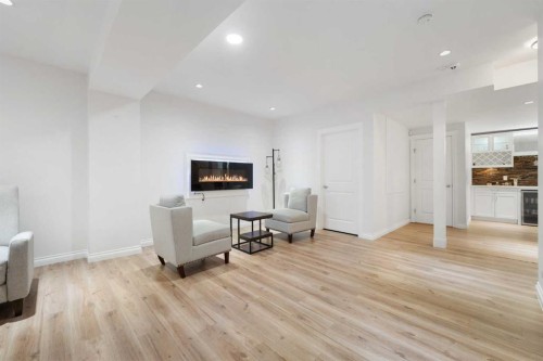 99 Evansglen Circle Nw, Calgary, AB - Indoor With Fireplace