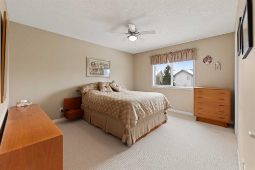 43 Cougarstone Court Sw, Calgary, AB - Indoor Photo Showing Bedroom