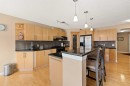 43 Cougarstone Court Sw, Calgary, AB  - Indoor Photo Showing Kitchen 