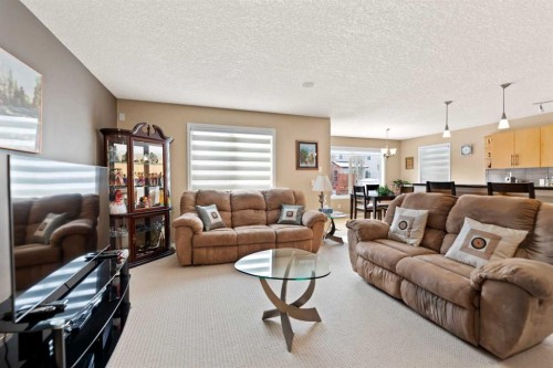 43 Cougarstone Court Sw, Calgary, AB - Indoor Photo Showing Living Room