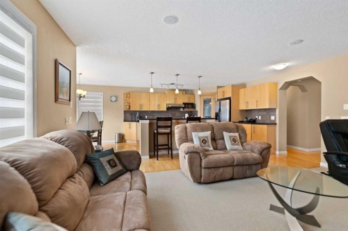43 Cougarstone Court Sw, Calgary, AB - Indoor Photo Showing Living Room