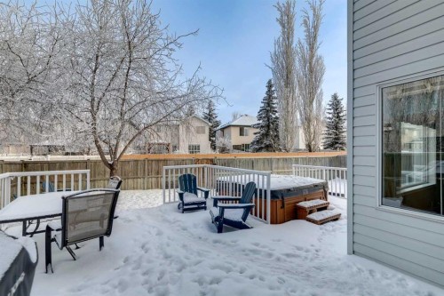 304 Mt. Brewster Circle Se, Calgary, AB - Outdoor With Deck Patio Veranda With Exterior