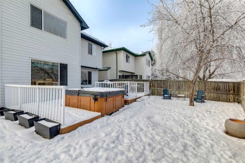 304 Mt. Brewster Circle Se, Calgary, AB - Outdoor With Deck Patio Veranda With Exterior