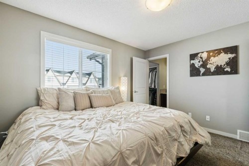 50 Fireside Circle, Cochrane, AB - Indoor Photo Showing Bedroom