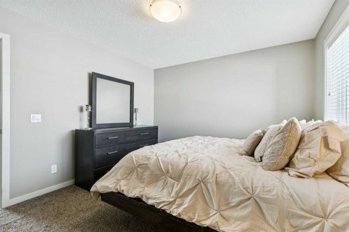 50 Fireside Circle, Cochrane, AB - Indoor Photo Showing Bedroom
