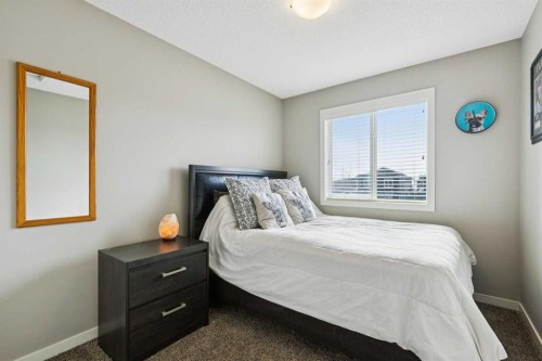 50 Fireside Circle, Cochrane, AB - Indoor Photo Showing Bedroom