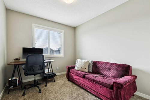 50 Fireside Circle, Cochrane, AB - Indoor Photo Showing Other Room