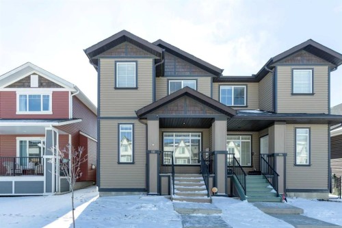 50 Fireside Circle, Cochrane, AB - Outdoor With Facade