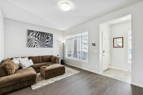 50 Fireside Circle, Cochrane, AB - Indoor Photo Showing Living Room