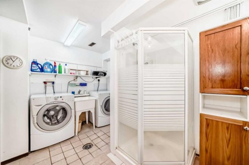 15 Whitewood Bay Ne, Calgary, AB - Indoor Photo Showing Laundry Room