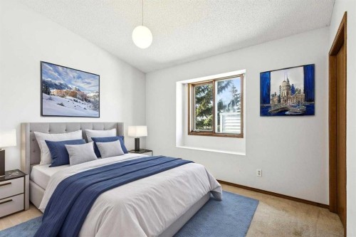 136 Scenic Acres Drive Nw, Calgary, AB - Indoor Photo Showing Bedroom