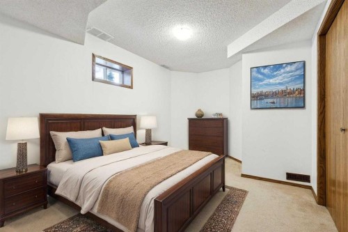 136 Scenic Acres Drive Nw, Calgary, AB - Indoor Photo Showing Bedroom
