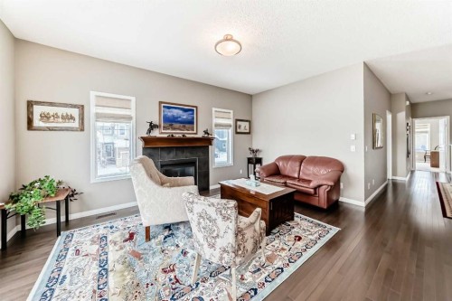 266 Fireside Place, Cochrane, AB - Indoor Photo Showing Living Room With Fireplace