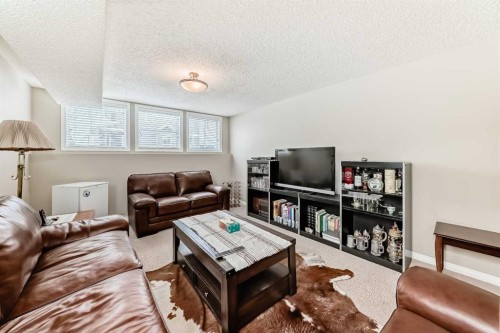 266 Fireside Place, Cochrane, AB - Indoor Photo Showing Living Room