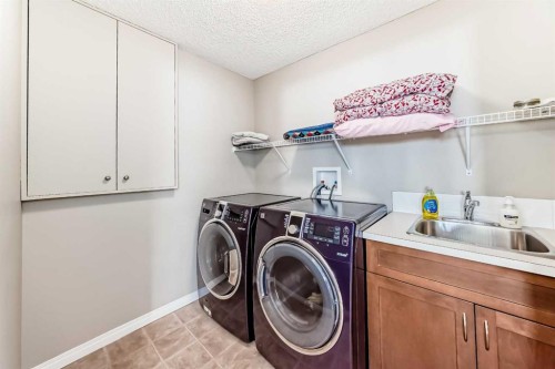266 Fireside Place, Cochrane, AB - Indoor Photo Showing Laundry Room
