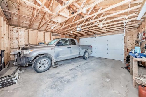 266 Fireside Place, Cochrane, AB - Indoor Photo Showing Garage
