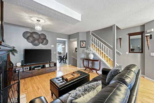 64 Abbeydale Villas Ne, Calgary, AB - Indoor Photo Showing Living Room