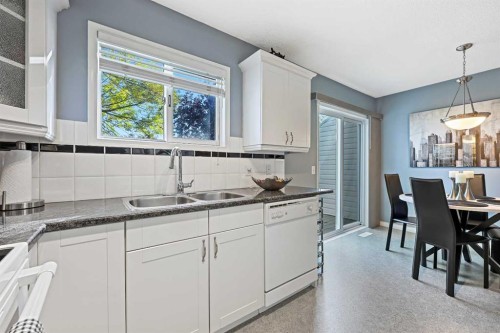 64 Abbeydale Villas Ne, Calgary, AB - Indoor Photo Showing Kitchen With Double Sink