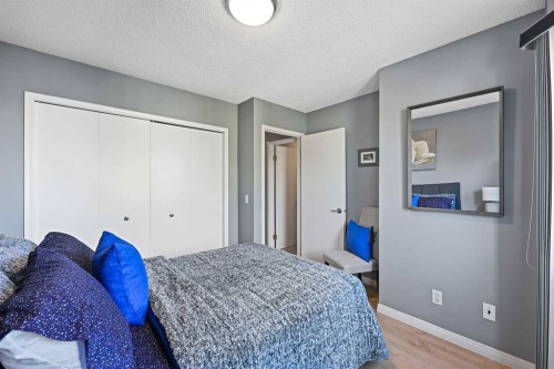 64 Abbeydale Villas Ne, Calgary, AB - Indoor Photo Showing Bedroom