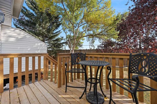 64 Abbeydale Villas Ne, Calgary, AB - Outdoor With Deck Patio Veranda