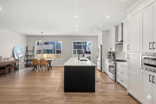 40 West Grove Link Sw, Calgary, AB - Indoor Photo Showing Kitchen With Upgraded Kitchen