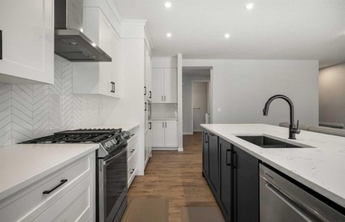 40 West Grove Link Sw, Calgary, AB - Indoor Photo Showing Kitchen With Upgraded Kitchen