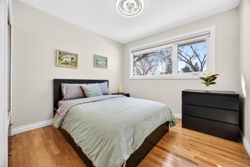154 Windermere Road Sw, Calgary, AB - Indoor Photo Showing Bedroom