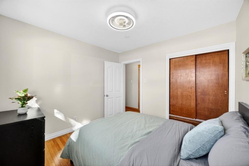 154 Windermere Road Sw, Calgary, AB - Indoor Photo Showing Bedroom