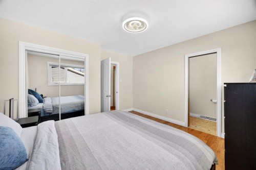 154 Windermere Road Sw, Calgary, AB - Indoor Photo Showing Bedroom