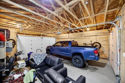 154 Windermere Road Sw, Calgary, AB - Indoor Photo Showing Garage