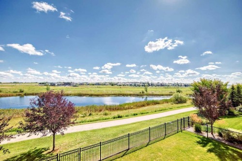 239 Stonemere Green, Chestermere, AB - Outdoor With Body Of Water With View