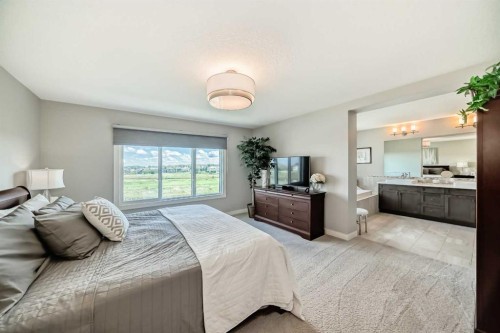 239 Stonemere Green, Chestermere, AB - Indoor Photo Showing Bedroom