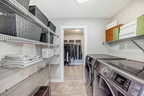 239 Stonemere Green, Chestermere, AB - Indoor Photo Showing Laundry Room