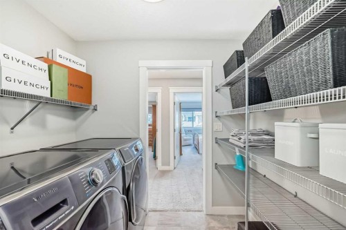 239 Stonemere Green, Chestermere, AB - Indoor Photo Showing Laundry Room