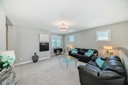 239 Stonemere Green, Chestermere, AB - Indoor Photo Showing Living Room