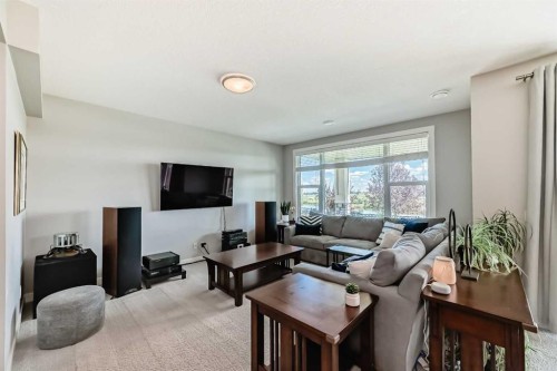 239 Stonemere Green, Chestermere, AB - Indoor Photo Showing Living Room