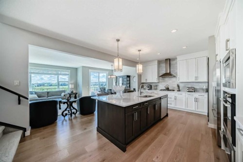 239 Stonemere Green, Chestermere, AB - Indoor Photo Showing Kitchen With Upgraded Kitchen