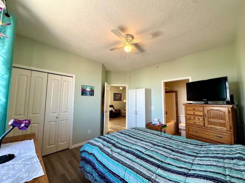 323-43 Sunrise Loop Se, High River, AB - Indoor Photo Showing Bedroom