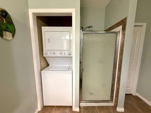 323-43 Sunrise Loop Se, High River, AB - Indoor Photo Showing Laundry Room