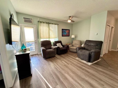 323-43 Sunrise Loop Se, High River, AB - Indoor Photo Showing Living Room