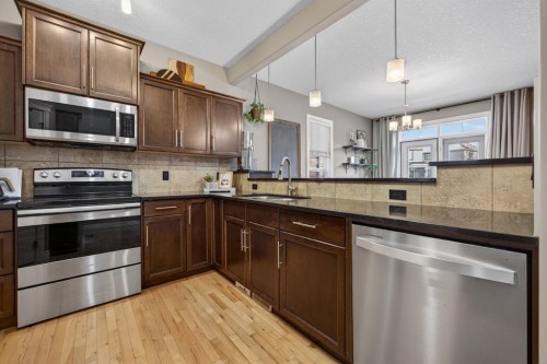 232 Mahogany Terrace Se, Calgary, AB - Indoor Photo Showing Kitchen With Stainless Steel Kitchen