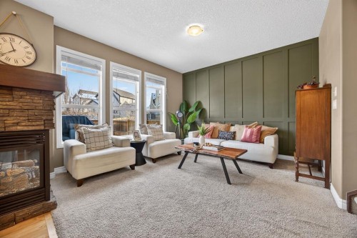 232 Mahogany Terrace Se, Calgary, AB - Indoor Photo Showing Living Room With Fireplace