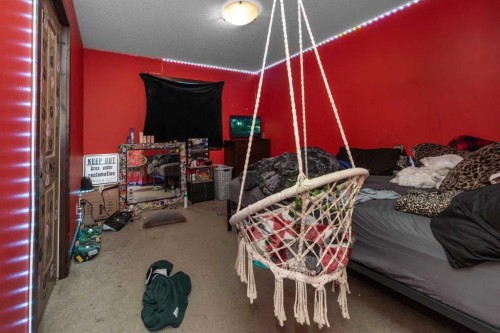 100 Willow Ridge Link, Diamond Valley, AB - Indoor Photo Showing Other Room