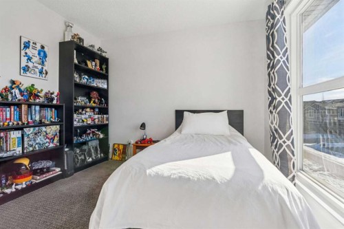 58 Buckskin Way, Cochrane, AB - Indoor Photo Showing Bedroom