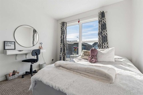 58 Buckskin Way, Cochrane, AB - Indoor Photo Showing Bedroom