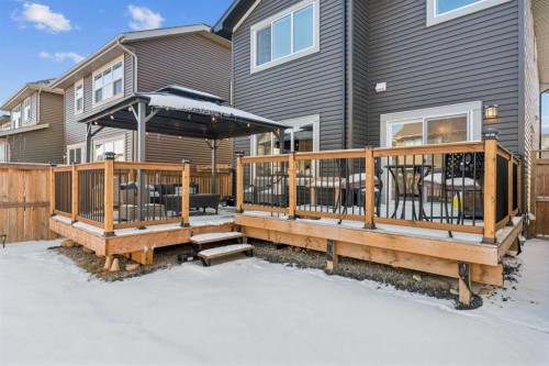 58 Buckskin Way, Cochrane, AB - Outdoor With Deck Patio Veranda With Exterior