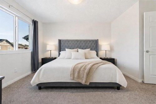 58 Buckskin Way, Cochrane, AB - Indoor Photo Showing Bedroom